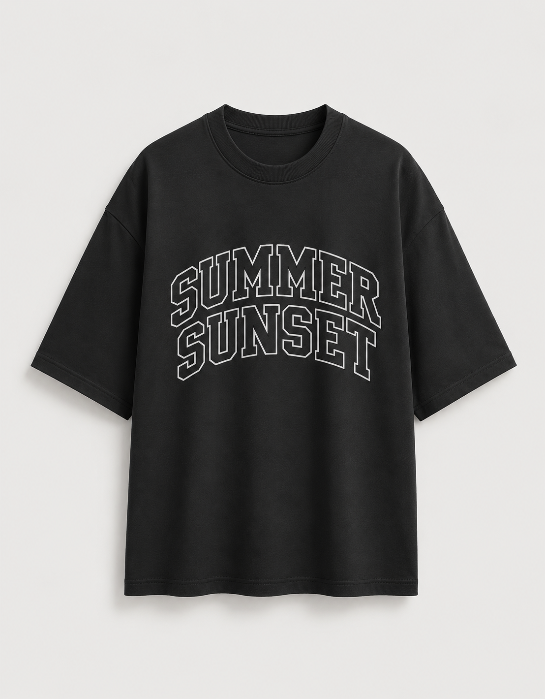 A black  t-shirt with 'SUMMER SUNSET' printed in white arched block letters across the chest, displayed on a light gray background.